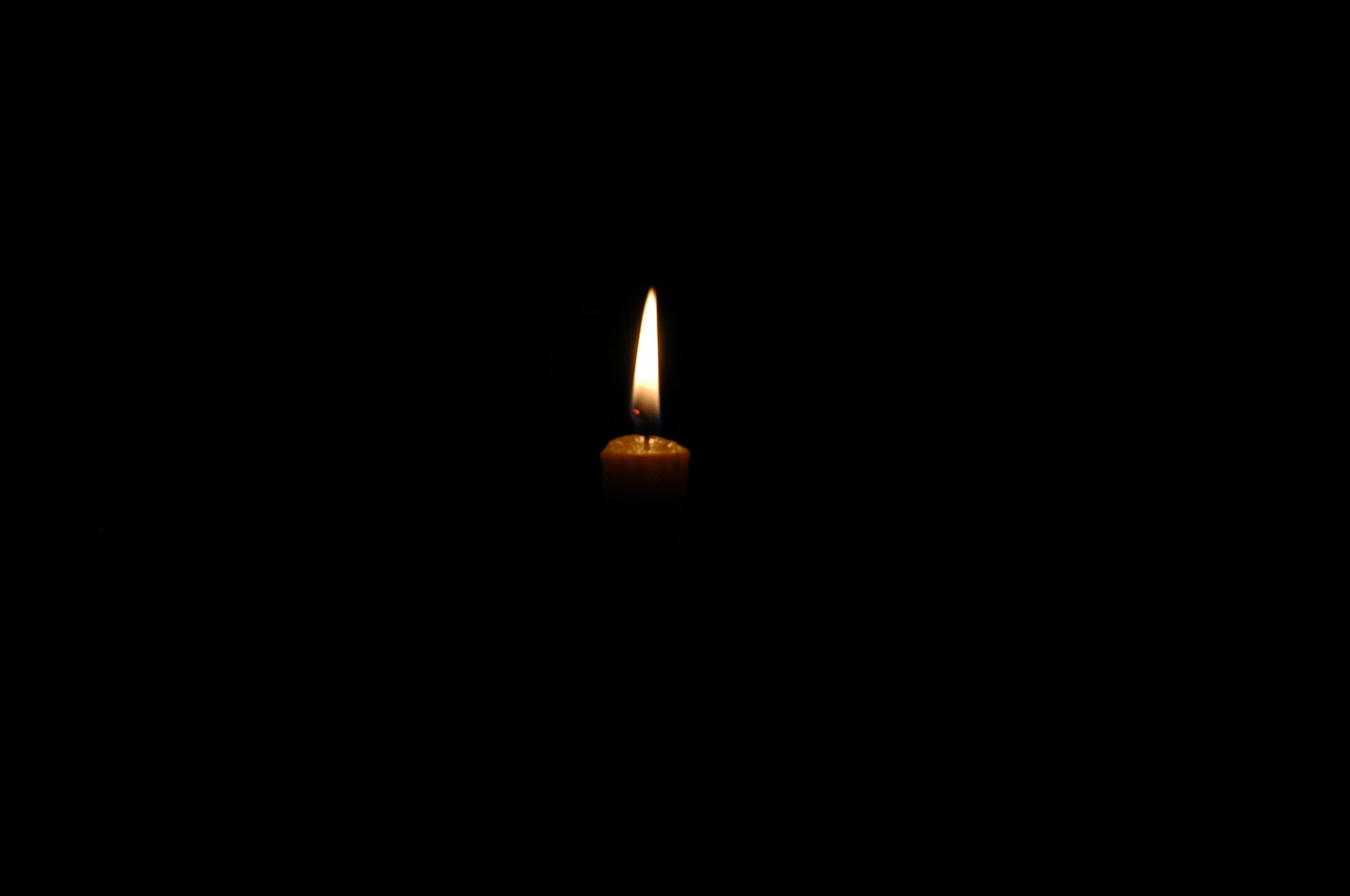 Candle In Darkness
